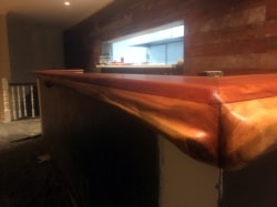 Finished timber slab bar