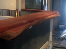 Finished timber slab bar