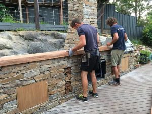 Fitting a bloodwood benchtop to a stone BBQ