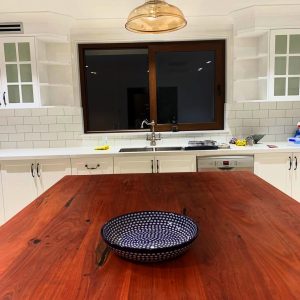 Kitchen island with a thick timber top