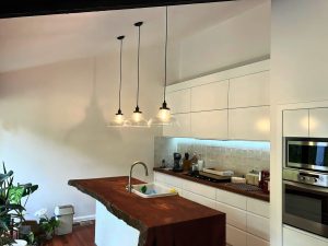 Waterfall end on a solid timber kitchen bench