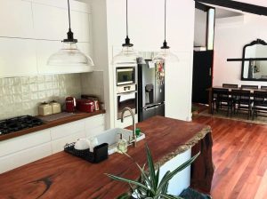 Timber benchtop with a waterfall end